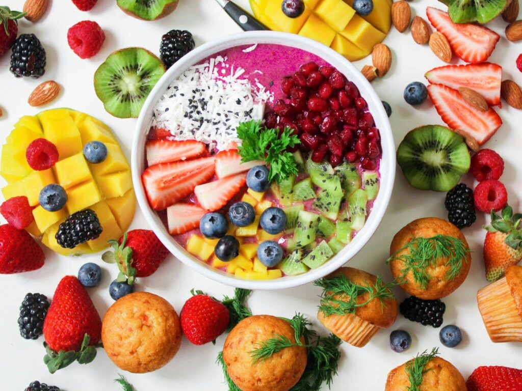Colorful salad with a variety of vegetables and lean protein, representing real-life healthy eating choices."